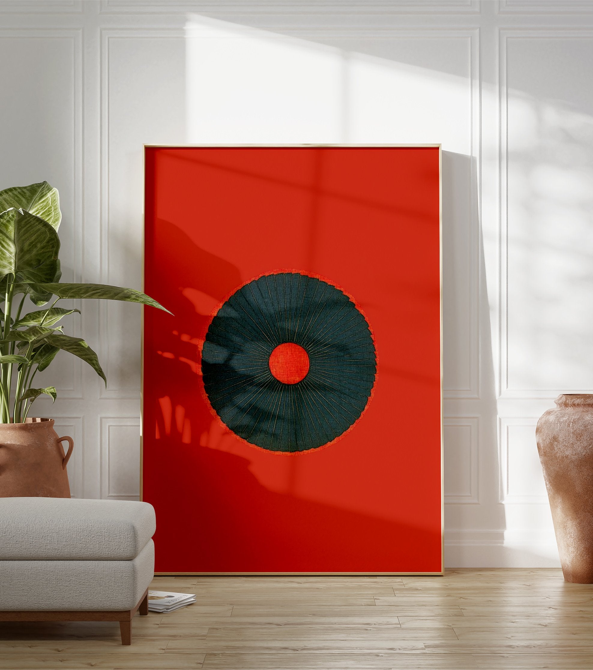 Minimalist red and dark teal abstract wall art with a central radiating circle design on a solid red background. - Image 3
