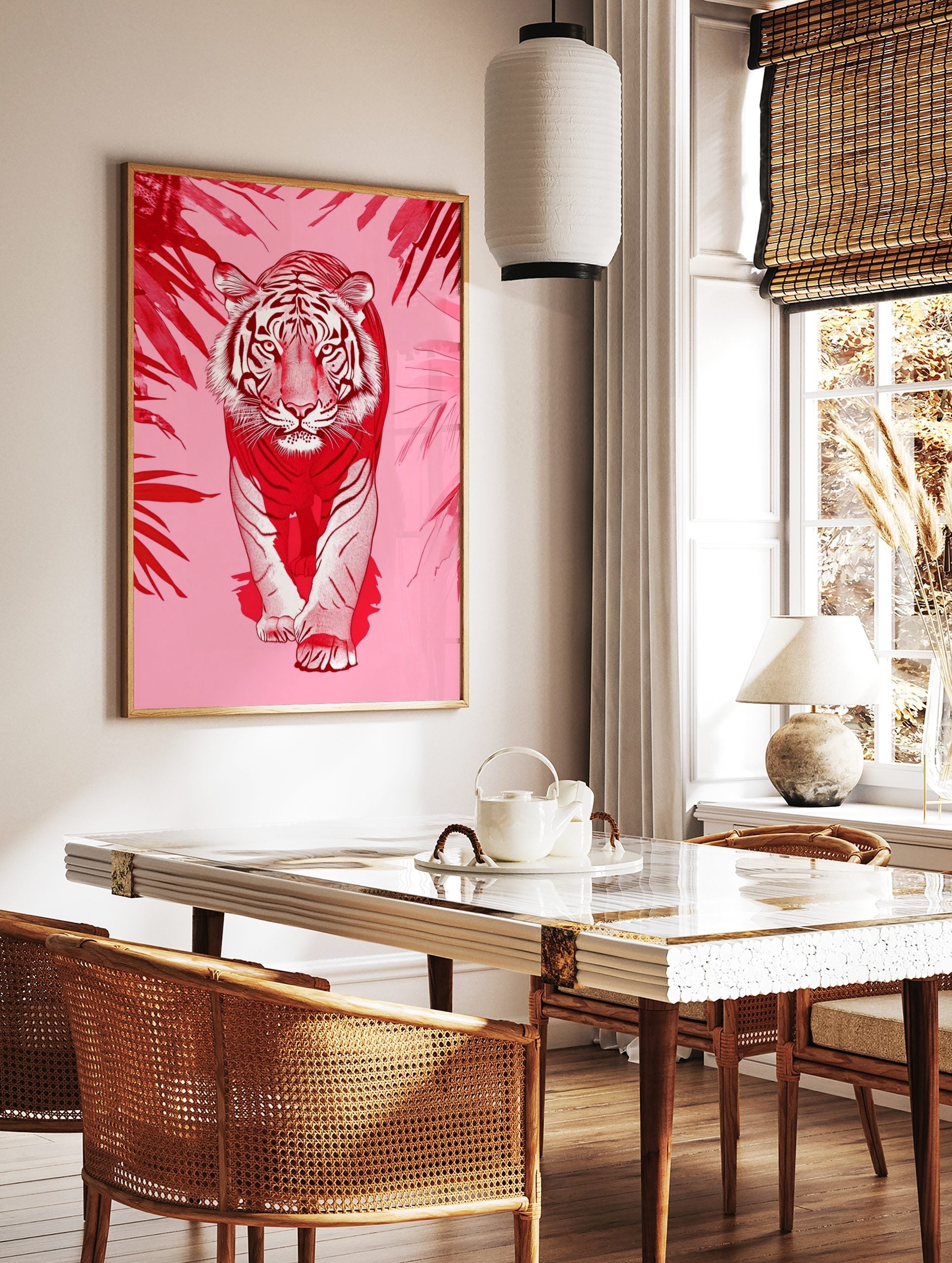 Red and white illustrative tiger walking forward, framed by red tropical leaves on a pink background, in a styled room mockup