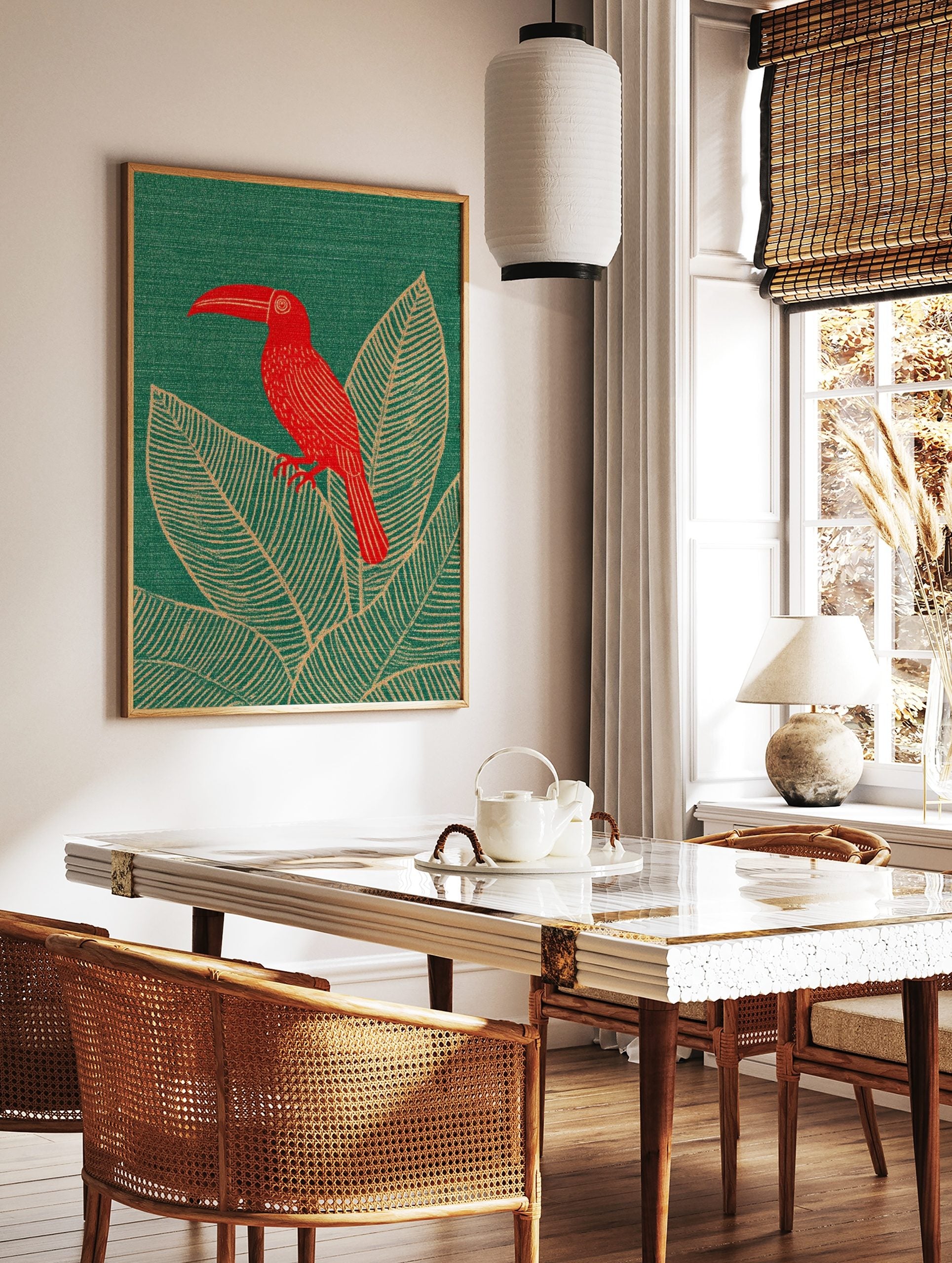 Red toucan bird with long beak perched on large tropical leaves on a green background, illustrative, in a styled room mockup