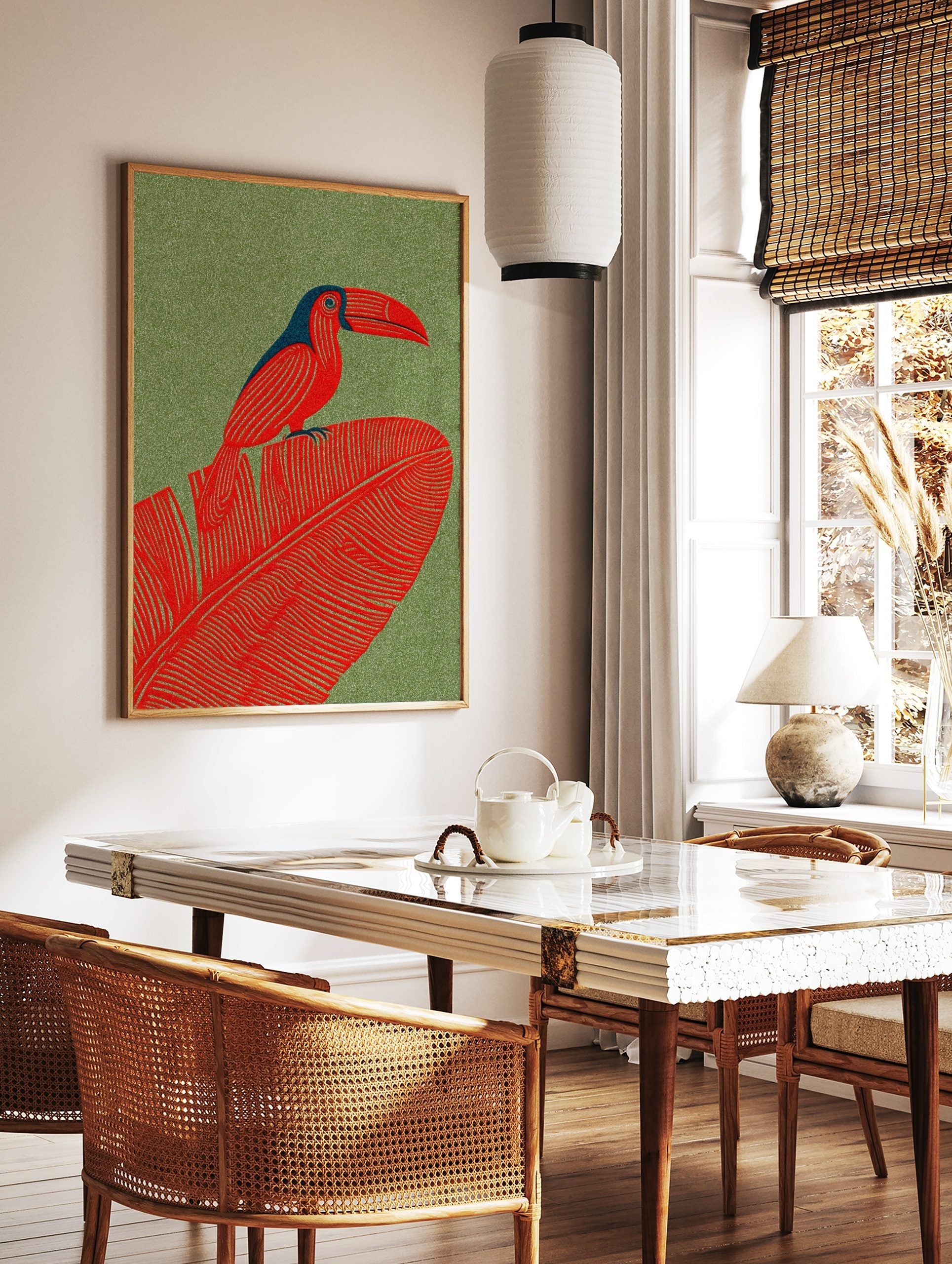 Red toucan with blue head perched on a large red tropical leaf against a green textured background, in a styled room mockup