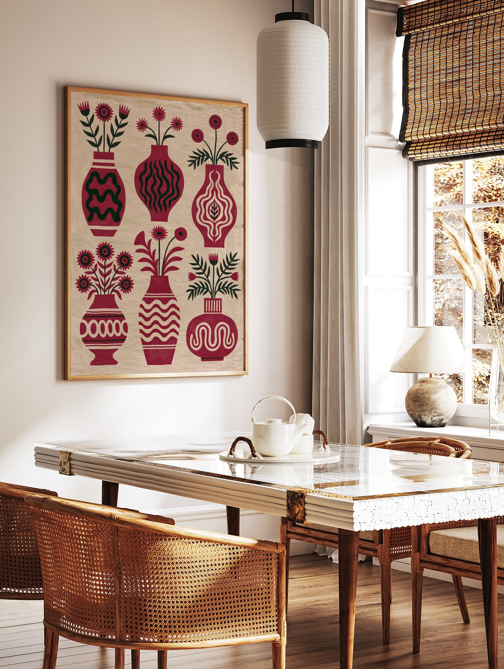 Botanical red vase wall art print with six floral arrangements and dark green foliage on a cream, in a styled room mockup