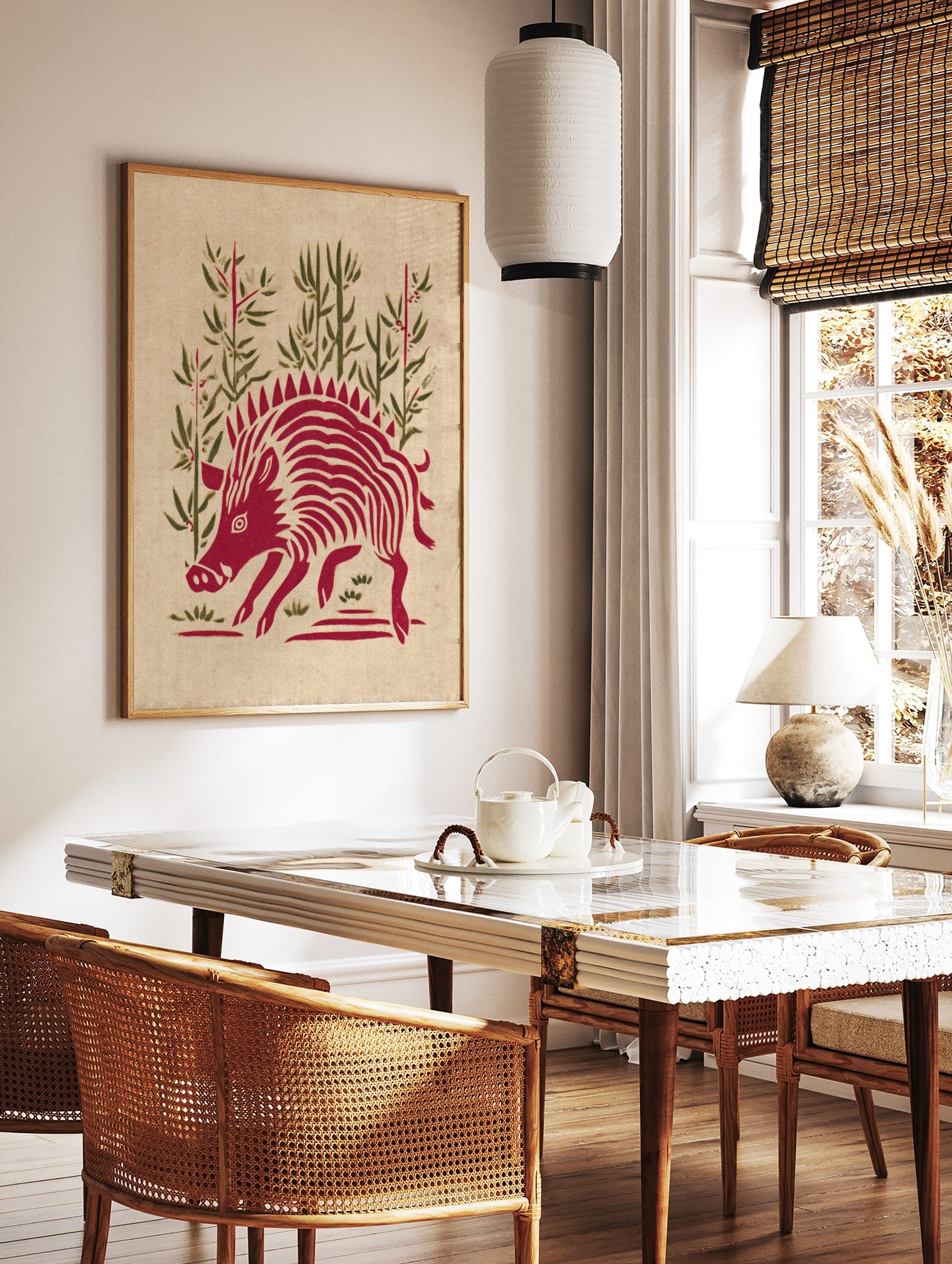 Red wild boar illustration with spiky mane and stripes, standing amidst green bamboo stalks and, in a styled room mockup