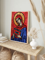 Stylised religious icon illustration holding a red cassette tape on a red background, graphic, in an alternate framed mockup