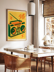 Retro boombox illustration with orange and green details on a yellow background, graphic music art, in a styled room mockup