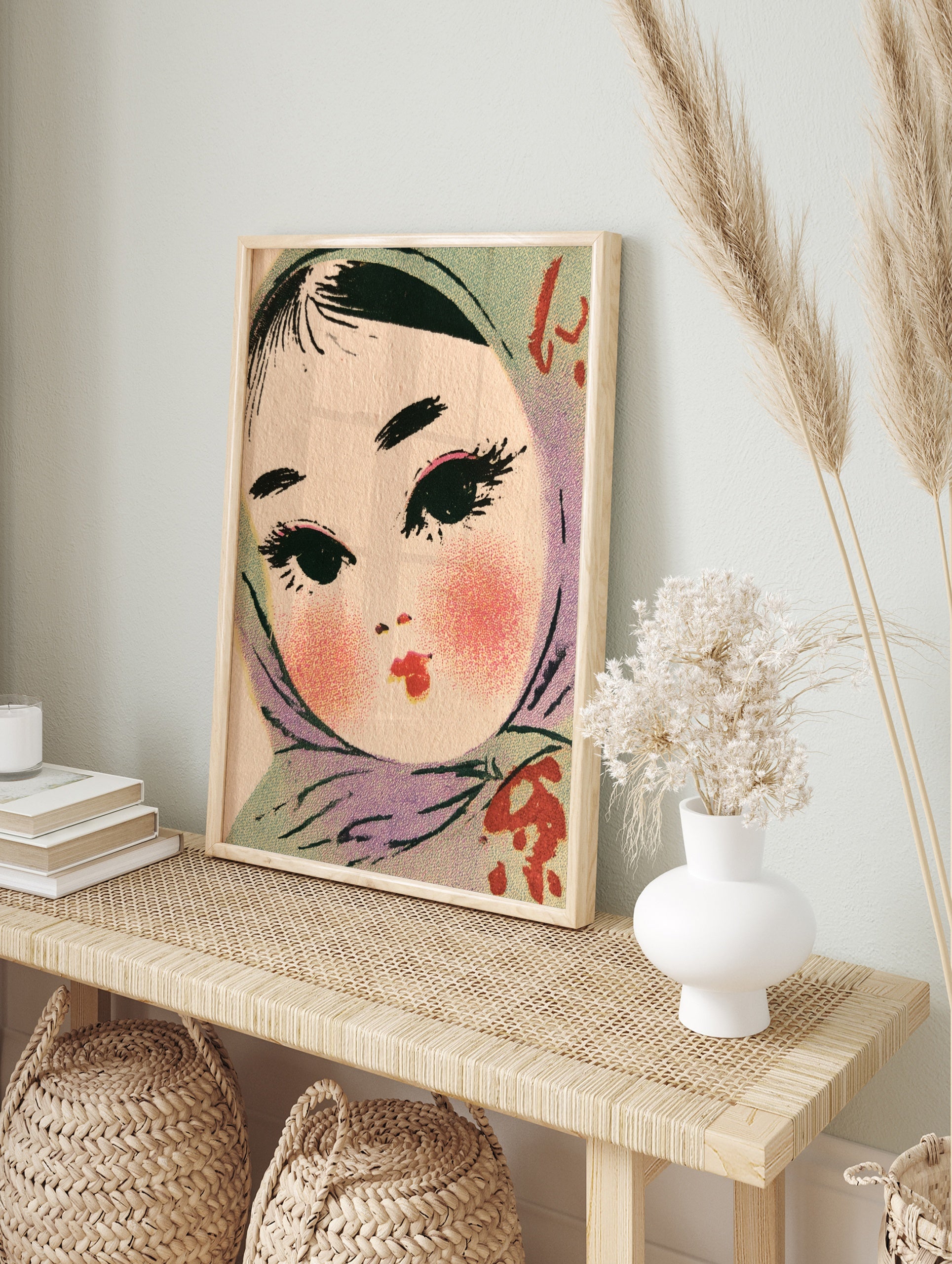 Retro illustration of a girl wearing a teal headscarf with blushed cheeks and red lips, in an alternate framed mockup