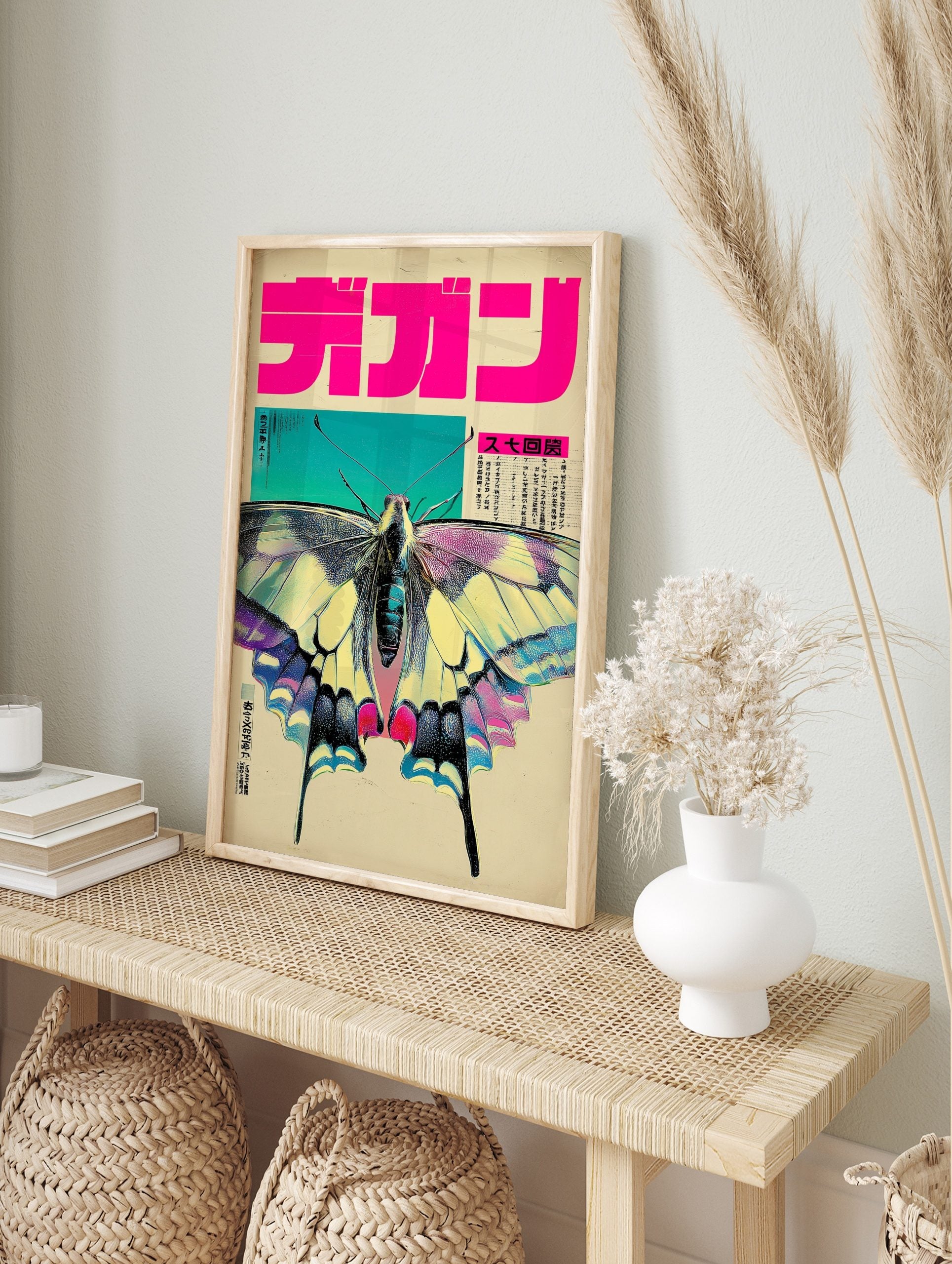 Pop art butterfly wall art with pink, teal, and yellow wings, Japanese typography, and, in an alternate framed mockup