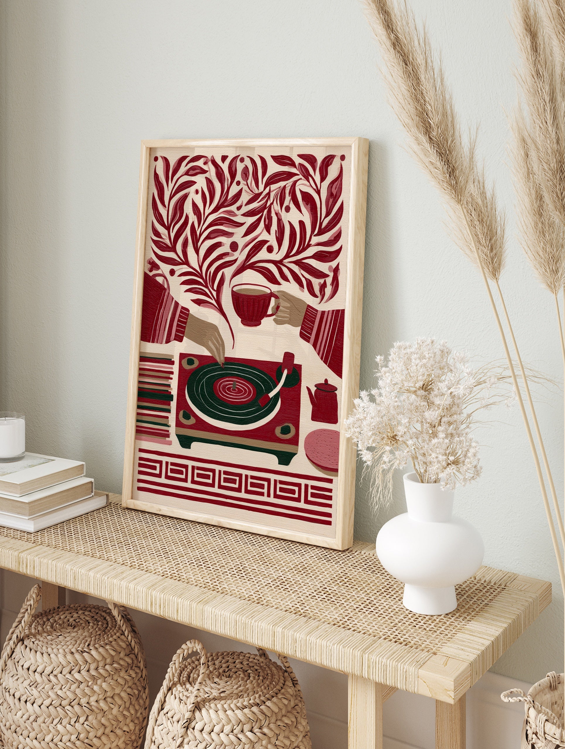 Retro illustrative print of a record player, teacup, and teapot surrounded by botanical, in an alternate framed mockup