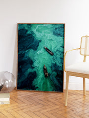Aerial view of two wooden boats on a river with swirling teal and turquoise water, abstract nature photography. - Image 2