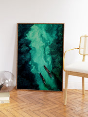 Aerial view of two wooden boats on a winding river with vibrant green, swirling water, surrounded by dense forest. River wall art. - Image 2