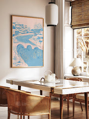 Illustrative riverside village wall art with pink and blue houses, a bridge over a river, and bare trees. - Image 2