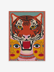 Stylised roaring orange and black tiger head with yellow eyes, and two yellow human-like faces below, on a teal and pink