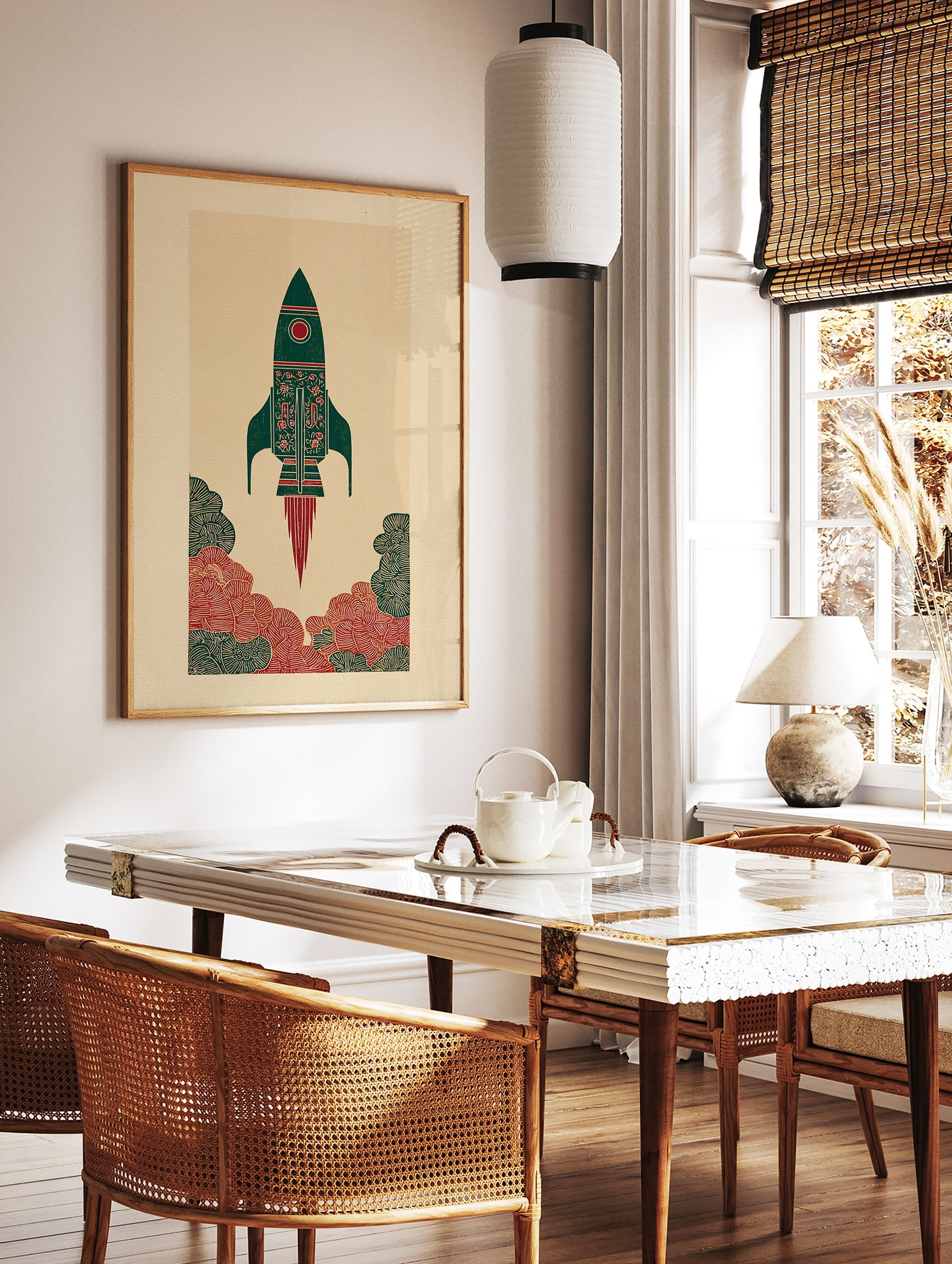 Illustrative rocket art print in green and red with cultural patterns, launching amidst stylized clouds on a beige background. - Image 3