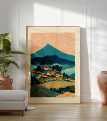 Rural landscape wall art depicting a mountain village with red-roofed houses, green trees, and an orange, swirling sky. - Image 3