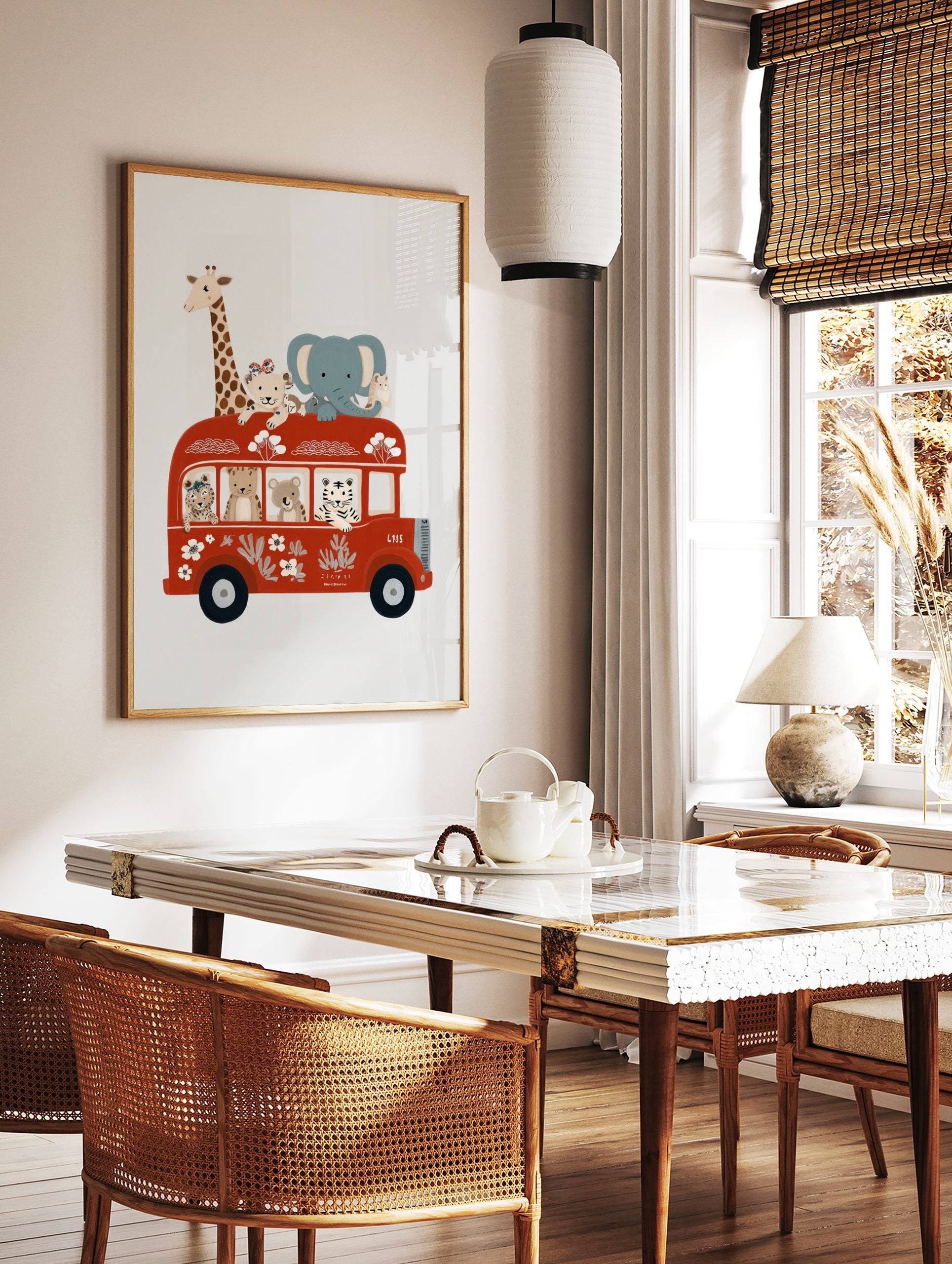 Illustrative wall art of safari animals on a red double-decker bus, featuring a giraffe, elephant, in a styled room mockup