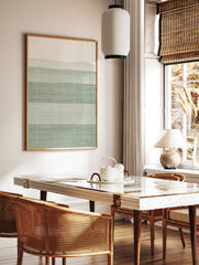 Minimalist abstract wall art print featuring horizontal stripes in sage green and off-white with a, in a styled room mockup