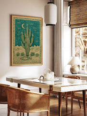 Saguaro cactus desert poster with a crescent moon, mountains, desert plants, and a fish on the ground, in green and beige. - Image 2