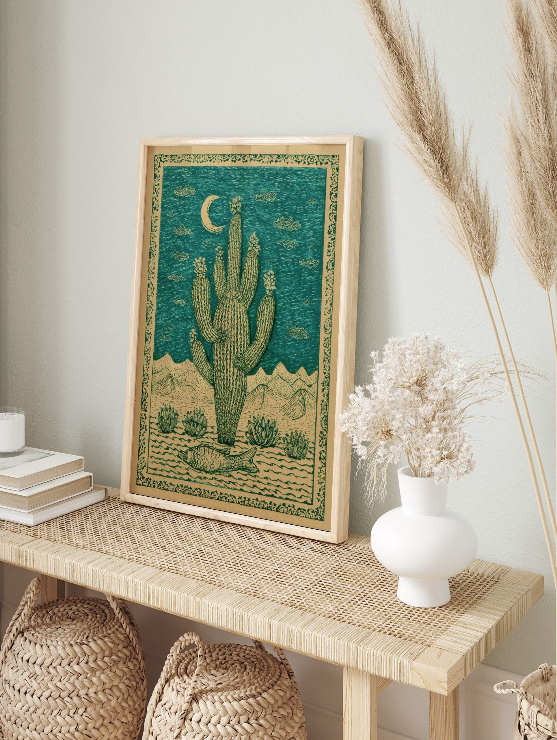 Saguaro cactus desert poster with a crescent moon, mountains, desert plants, and a fish on the ground, in green and beige. - Image 4
