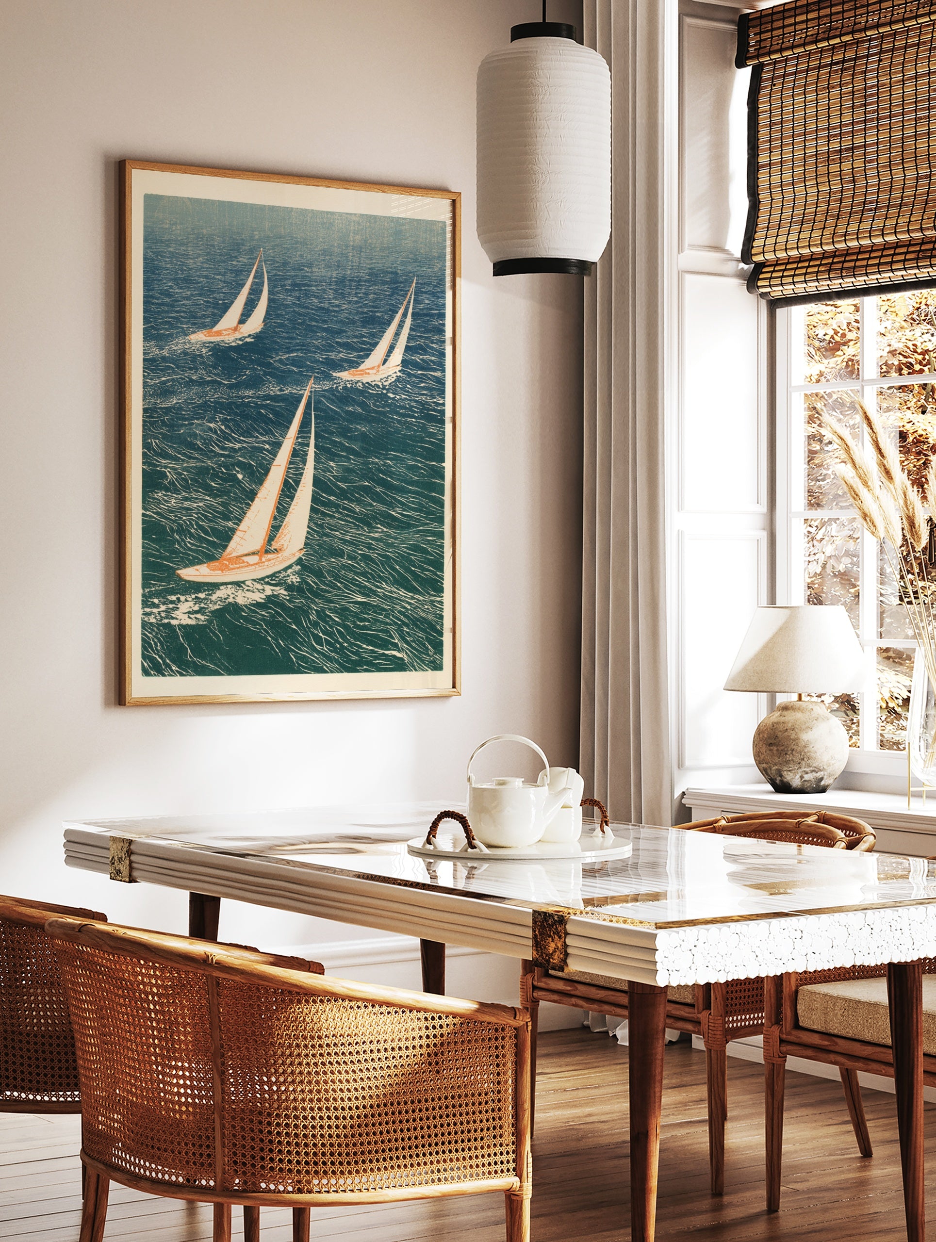 Illustrative art print of three sailboats sailing on choppy blue ocean water, in a styled room mockup