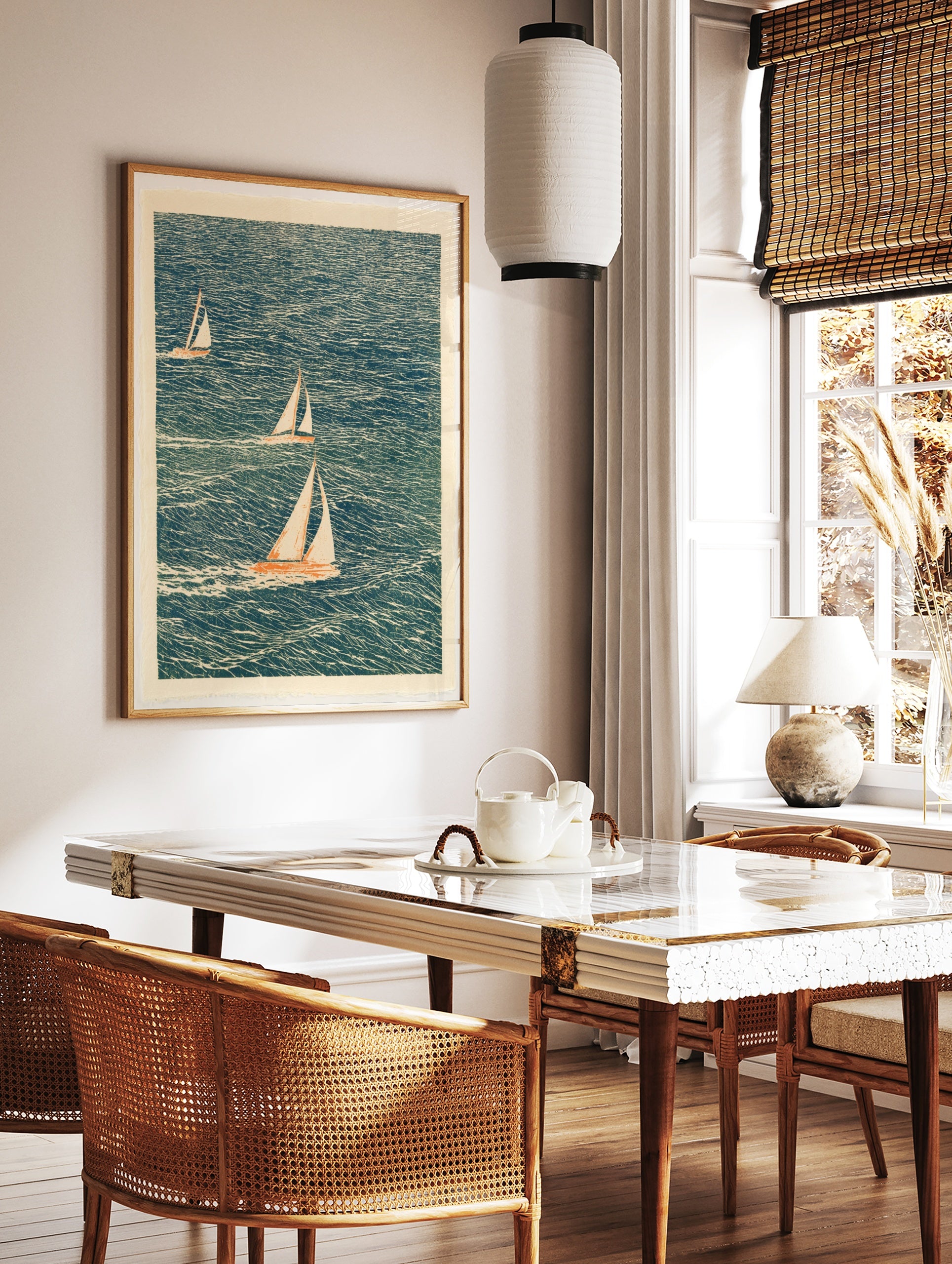 Illustrative sailboat wall art with three boats on a textured blue sea, cream sails, nautical print, in a styled room mockup