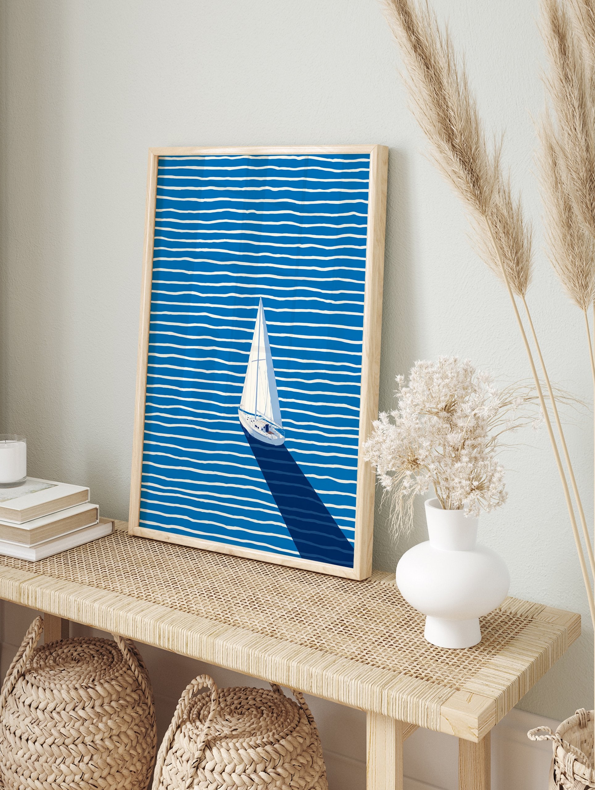 Minimalist sailboat wall art on a blue ocean with white wavy stripes and a long dark shadow, viewed from above. - Image 3