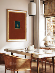 Minimalist sailboat wall art with a golden boat on a dark sea, red background, and gold borders, in a styled room mockup