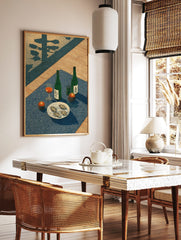 Japanese woodblock style print of two sake bottles, oysters on ice, a drink, and candles on a blue, in a styled room mockup