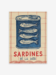 Illustrative blue sardine tin wall art with four fish and 'SARDINES DE LA MER' text on a cream and red grid background