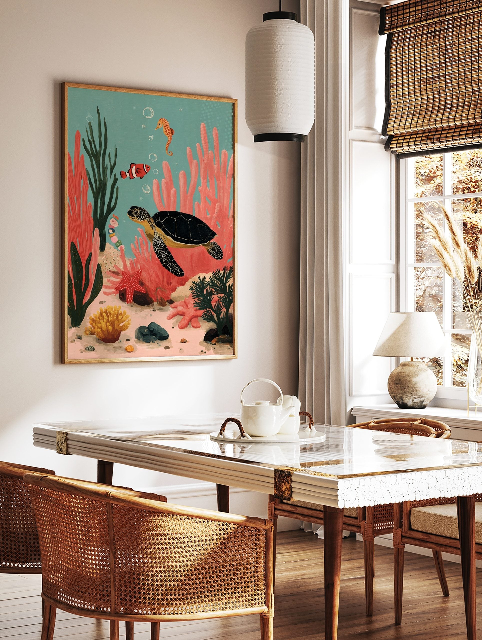 Colourful illustrative print of a sea turtle, clownfish, and seahorse in a vibrant coral reef, in a styled room mockup