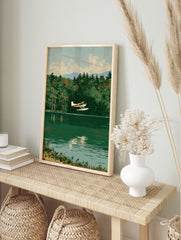 Vintage style illustration of a red and white seaplane flying over a calm green lake with a, in an alternate framed mockup