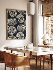 Stylised navy and cream ammonite seashell pattern illustration, repeating spiral shells, graphic, in a styled room mockup
