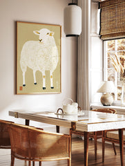 Illustrative sheep print with textured wool, Japanese calligraphy, and gold accents on a beige, in a styled room mockup