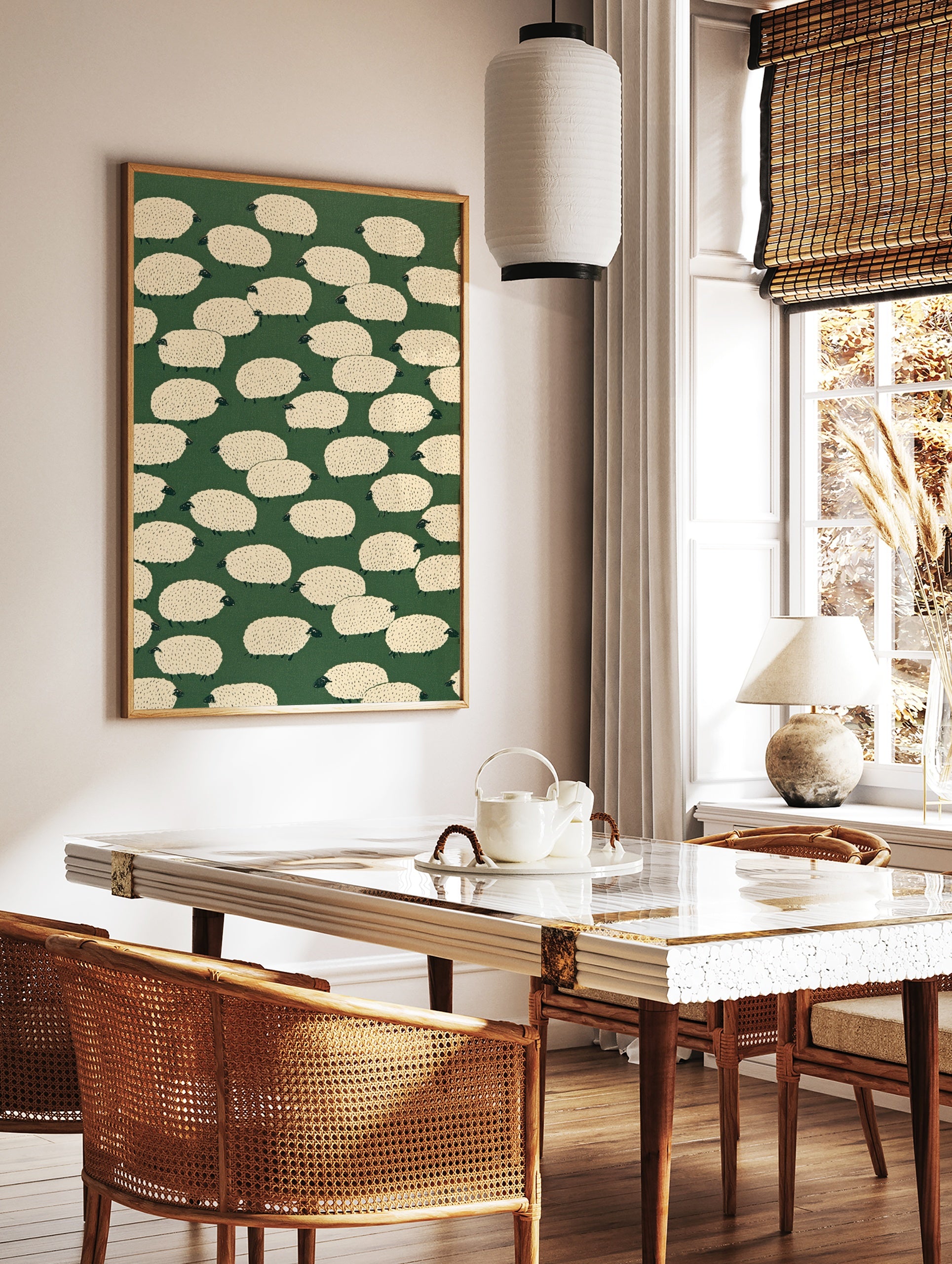 Illustrative sheep pattern art print with cream-coloured sheep on a solid dark green background, in a styled room mockup