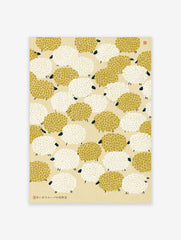 Repeating pattern of mustard yellow and white sheep with black faces on a cream background, illustrative animal art print