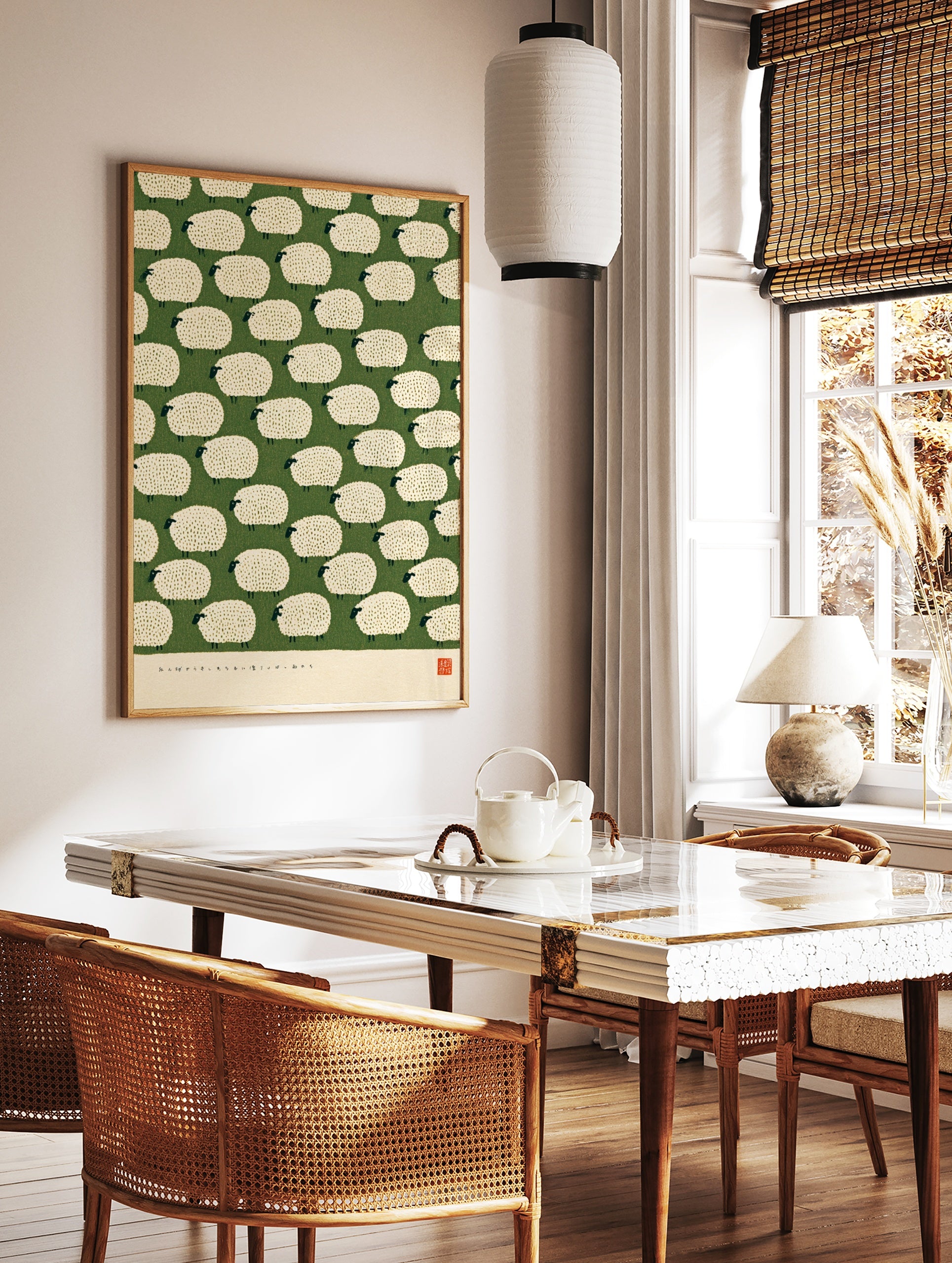 Illustrative pattern of white fluffy sheep on a green background with a red artist seal at the, in a styled room mockup