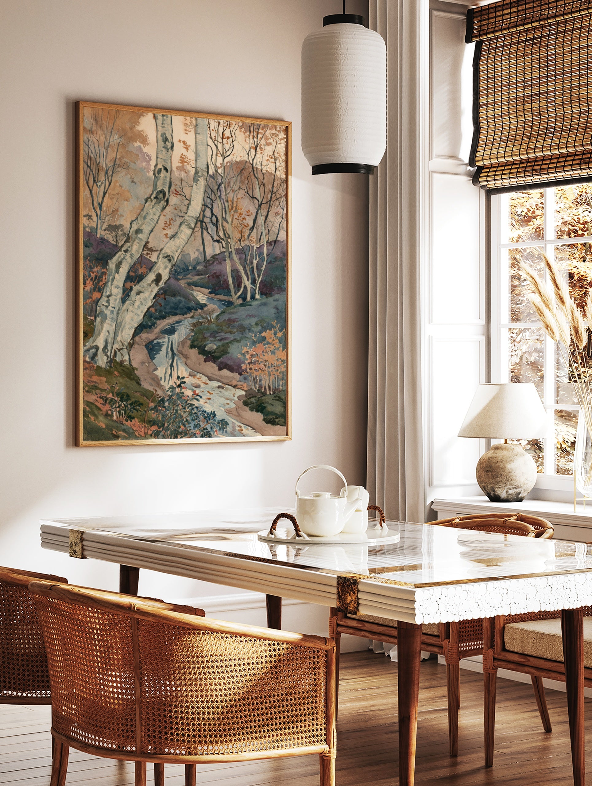 Watercolour painting of silver birch trees and a winding stream in an autumn forest landscape, in a styled room mockup