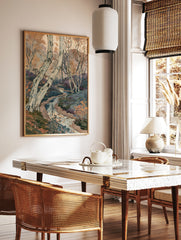 Watercolour painting of silver birch trees and a winding stream in an autumn forest landscape, in a styled room mockup
