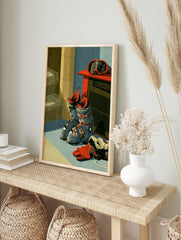 Illustrative wall art of blue ski boots, red goggles on a heater, and a red glove in a, in an alternate framed mockup