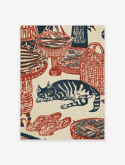 Woodblock style print featuring a sleeping cat surrounded by woven baskets of fish in red and navy blue ink
