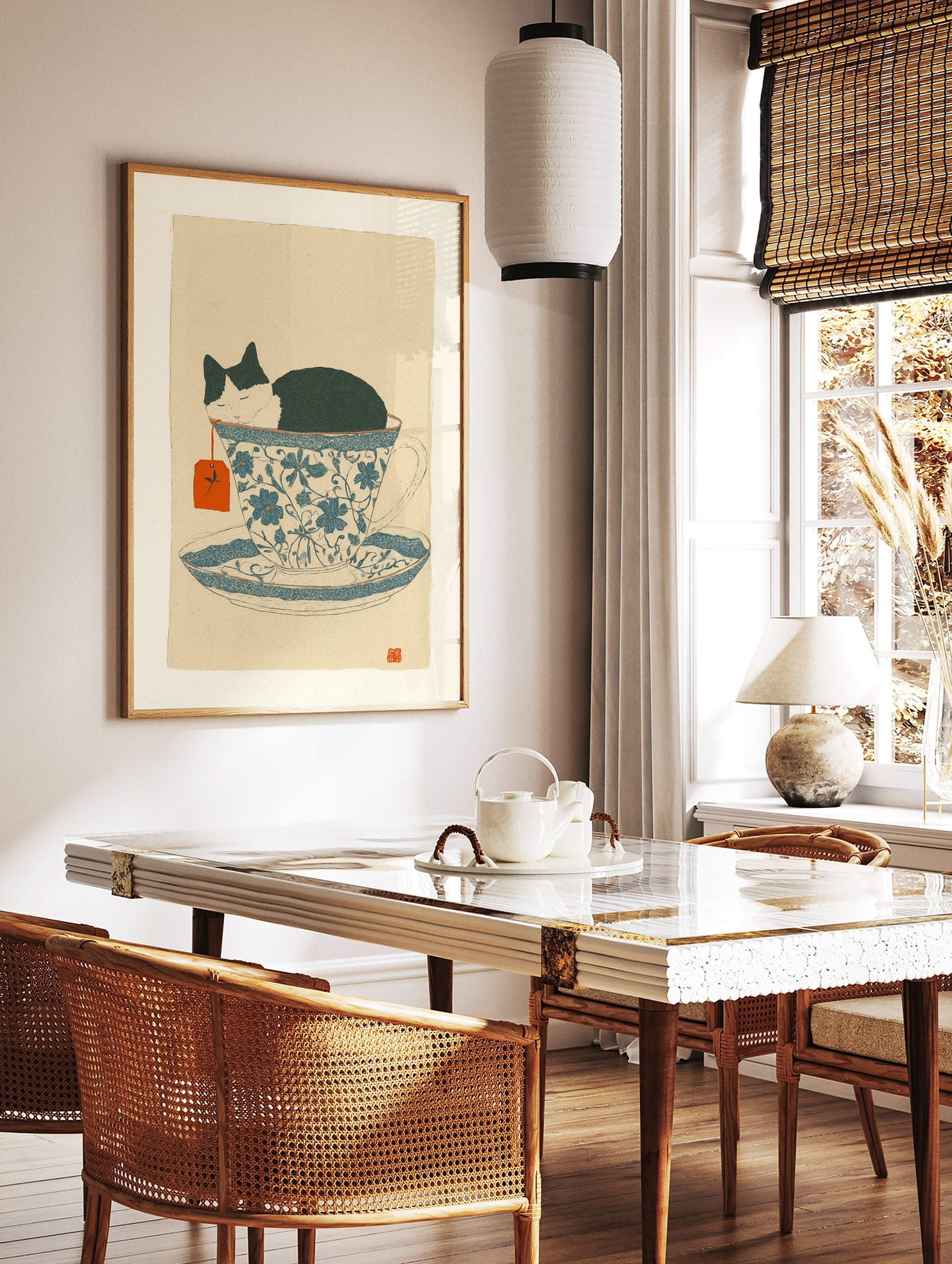 Whimsical cat art print showing a black and white cat sleeping soundly inside a blue and white patterned teacup. - Image 2