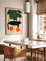 Illustrative blue cat sleeping in a green hammock under palm leaves with two orange circles on a, in a styled room mockup