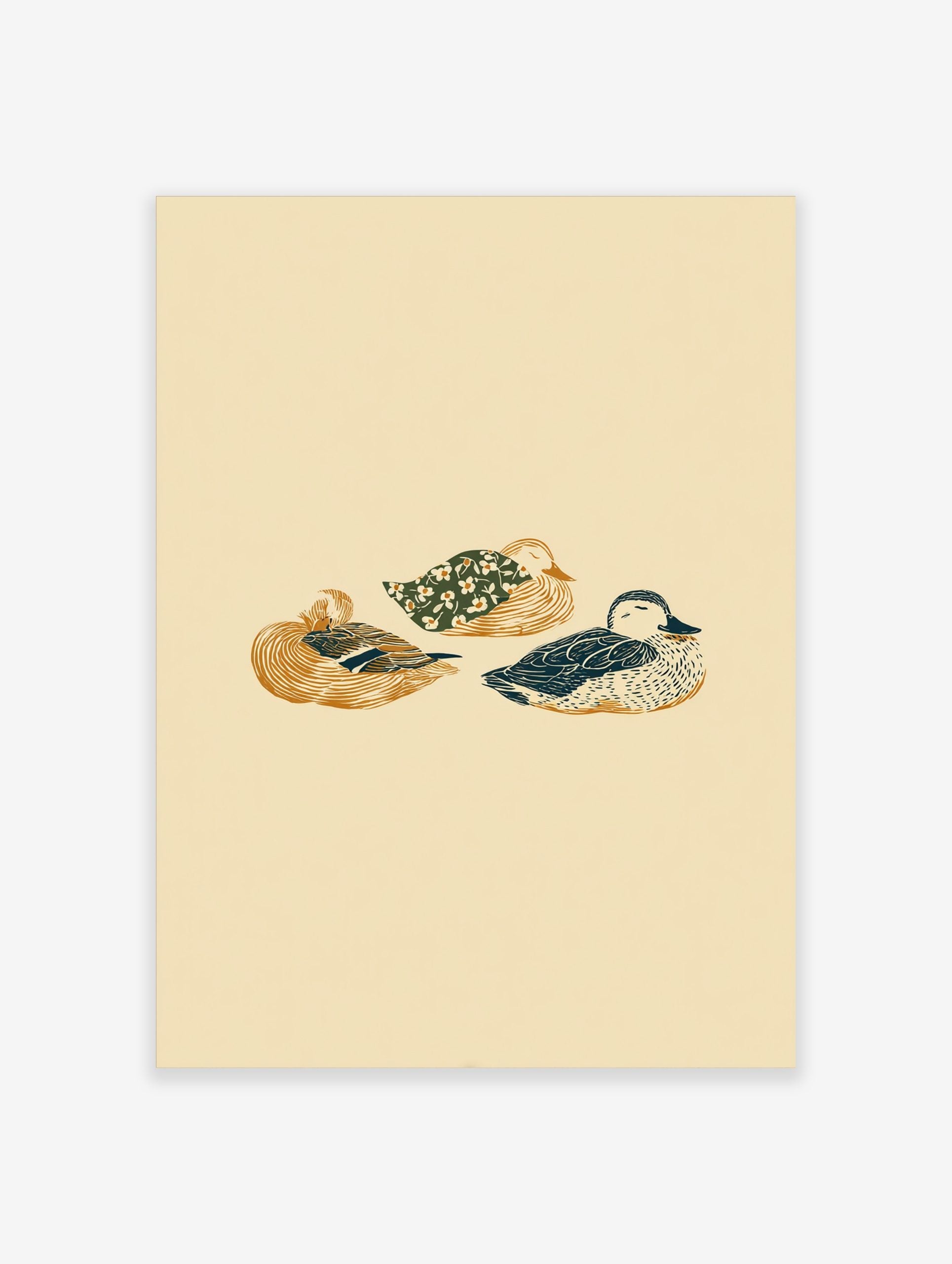 Illustrative print of three sleeping ducks in golden-brown, dark blue, and floral green on a light beige background