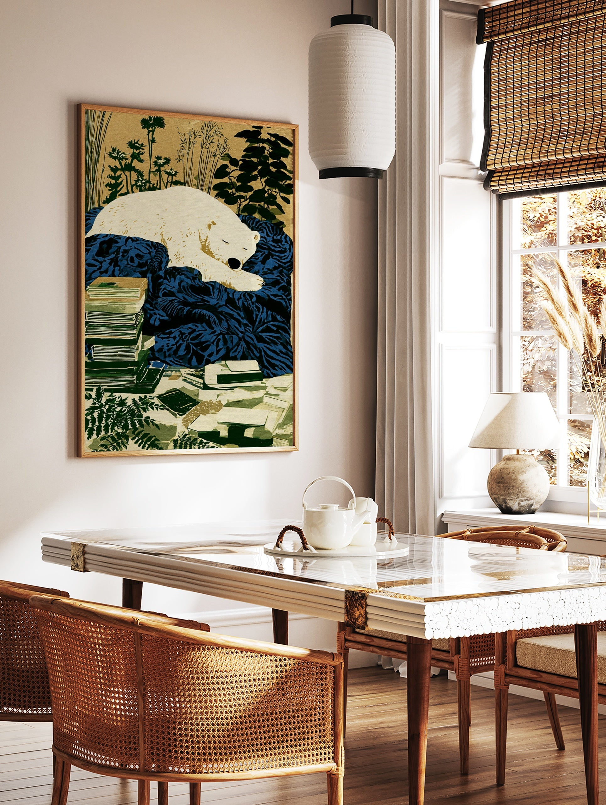 Illustration of a sleeping white polar bear on a deep blue blanket, with stacked books and plants, in a styled room mockup