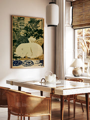Sleeping polar bear illustration on cream background with green and blue patterned details, art, in a styled room mockup