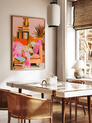 Impressionist style polar bear sleeping on a sofa with books and a houseplant, featuring pink and, in a styled room mockup