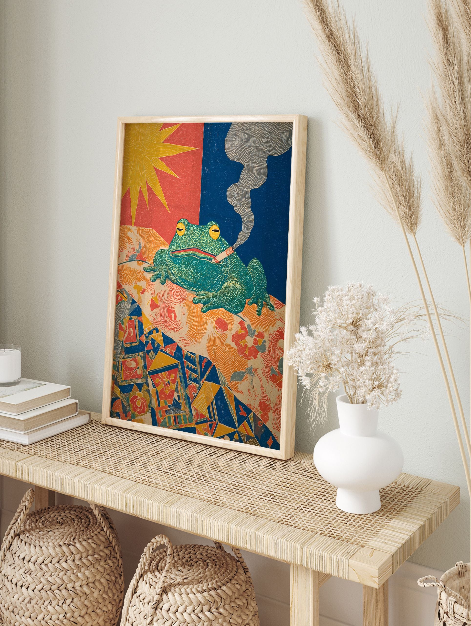 Vibrant woodblock print of a green smoking frog with yellow eyes on a patterned bed, under a yellow sun and blue sky. - Image 3
