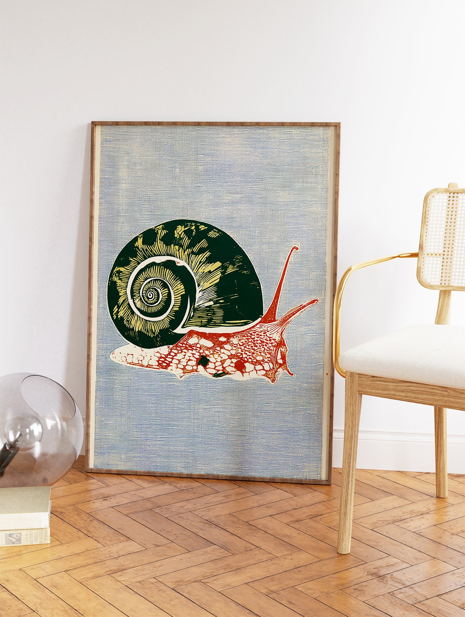 Botanical snail wall art print with a green shell and red body on a textured blue background in an illustrative style. - Image 2
