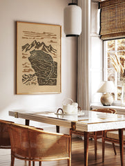 Stylised snow leopard resting on a rocky mountain ledge with peaks and clouds in a two-tone art, in a styled room mockup
