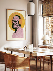Classical bust of Socrates wearing orange over-ear headphones on a yellow circular background art, in a styled room mockup
