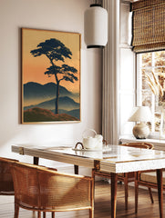 Japanese-style landscape print of a solitary pine tree on a ridge against misty mountains and an, in a styled room mockup