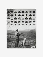 Monochrome print of man with shotgun and dog looking at pixelated Space Invaders in sky over rural landscape